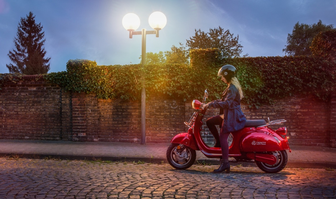 woman riding an electric scooter